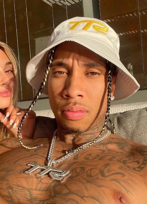 Highest Paid OnlyFans Creators Tyga  wearing cap