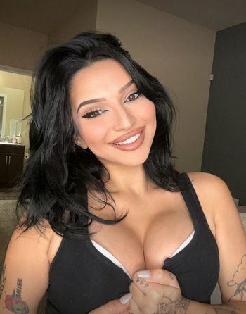 @thekianakumani on only fans is a wild indian princess. She's a proud wild punjabi model wearing black top showing big boobs.